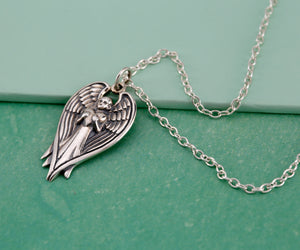 Guardian Angel on Cable Chain {"urlParam":"envisico=%7B%22canvas%22%3A%22f5e1774%22%2C%22layers%22%3A%5B%7B%22strand%22%3A%22c8bf04c%22%2C%22focal%22%3A%22c8bf015%22%7D%5D%2C%22f%22%3A1%7D"}