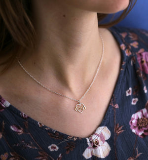 Two-Tone Infinite Love on 16" Cable Chain {"urlParam":"envisico=%7B%22canvas%22%3A%22f5e1773%22%2C%22layers%22%3A%5B%7B%22strand%22%3A%22c8bf04c%22%2C%22focal%22%3A%22c8bf00d%22%7D%5D%2C%22f%22%3A1%7D"}