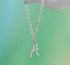 Letter A on Tiny Flat Cable Chain {"urlParam":"envisico=%7B%22canvas%22%3A%22f5e176e%22%2C%22layers%22%3A%5B%7B%22strand%22%3A%22c8bf052%22%2C%22focal%22%3A%22c8bef8e%22%7D%5D%2C%22f%22%3A1%7D"}